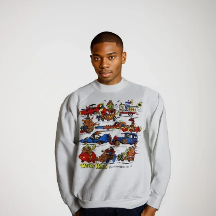 This rare Hanna Barbera sweatshirt features a nostalgic graphic print from the classic cartoon, Wacky Races.